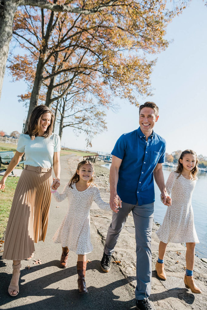 Philadelphia Family having fun walking by the water in Family Photo session