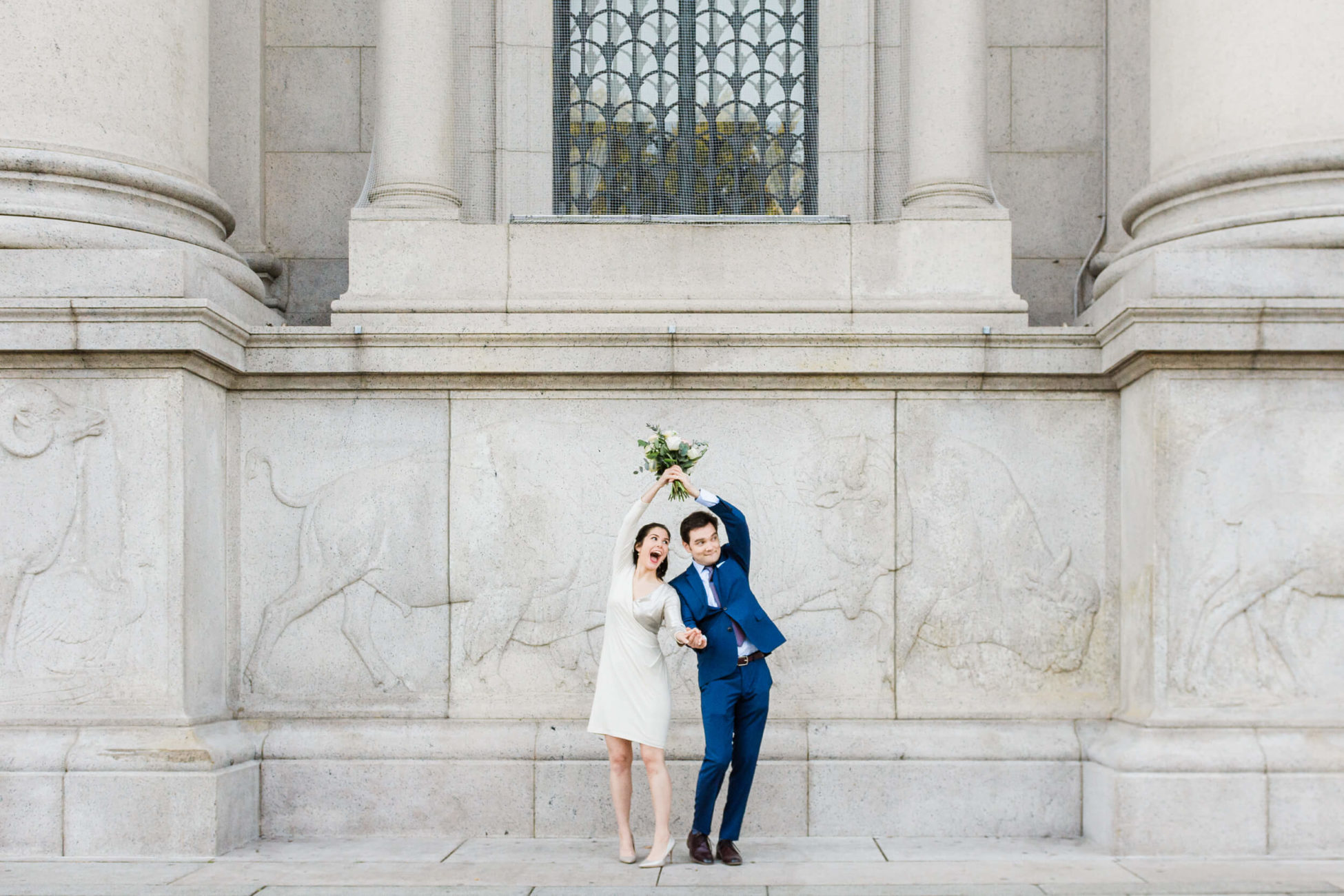 New York City Couple dancing outside the Museum of Natural History during their Elopement in Central Park