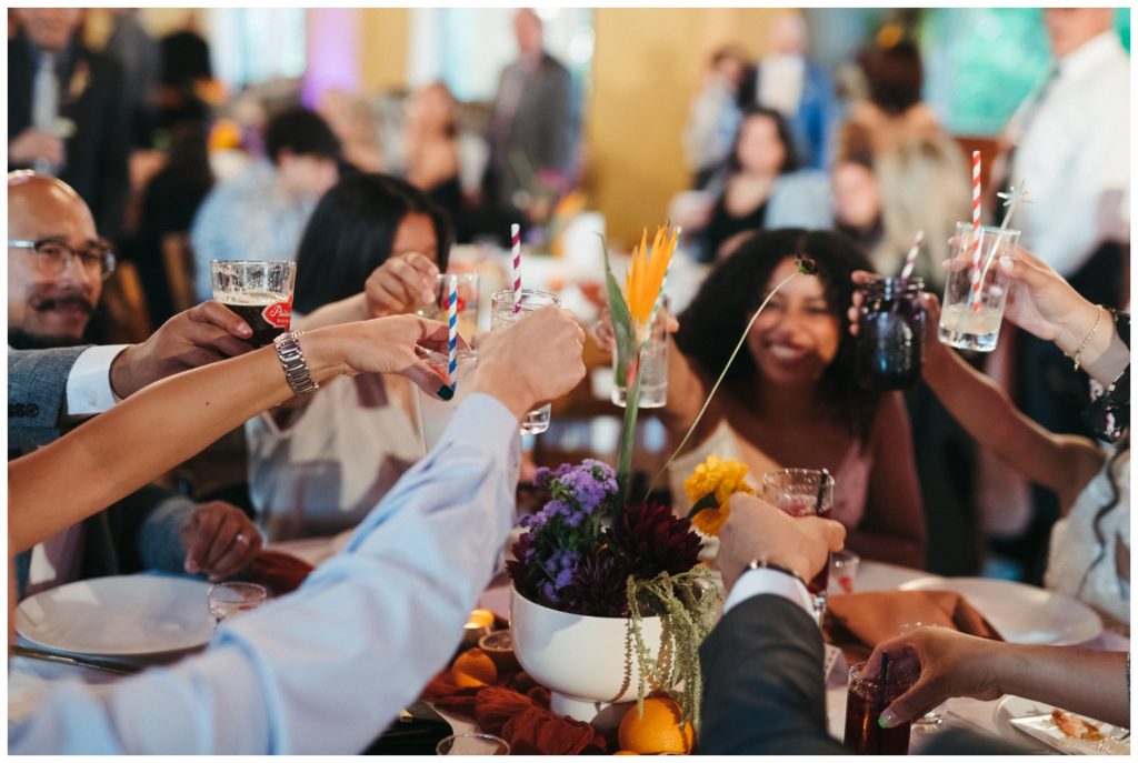 Guests toast to the wedding couple