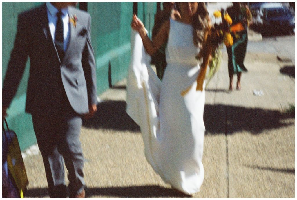 A micro wedding Philadelphia couple walks to their reception