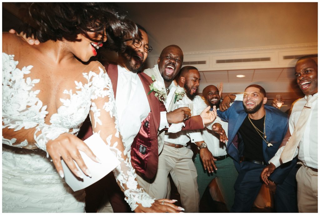 The bride dances with guests in wedding photography in philadelphia