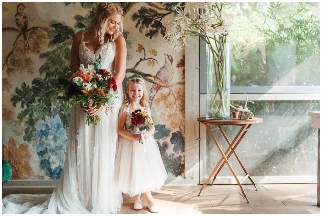 A bride and her daughter pose before a Philadelphia micro wedding