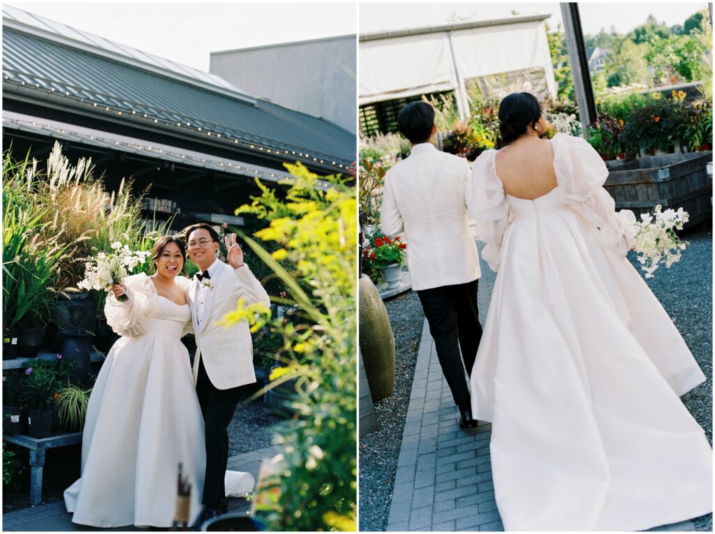 A groom walks with a bride in a puffy wedding dress through a garden.