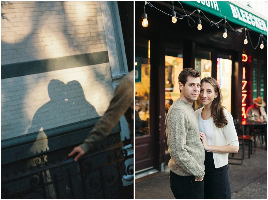 Matt and Jess stand in front of a pizza restaurant during their engagement session.