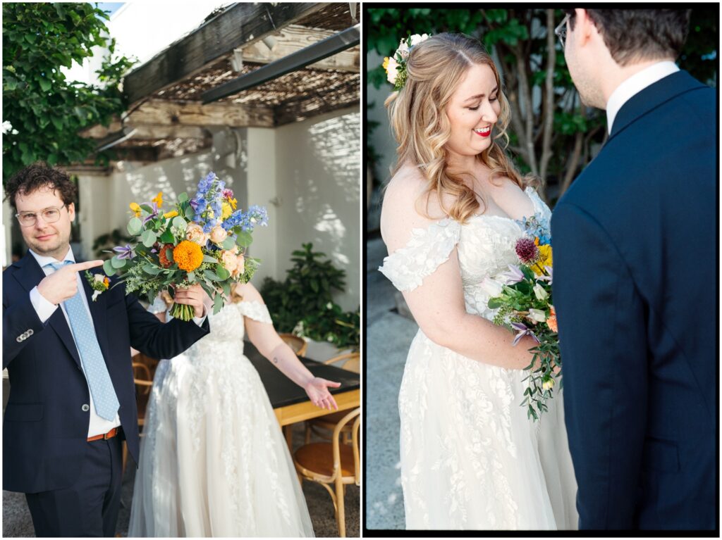A groom carries a bridal bouquet as he walks through a Philadelphia courtyard with a bride.