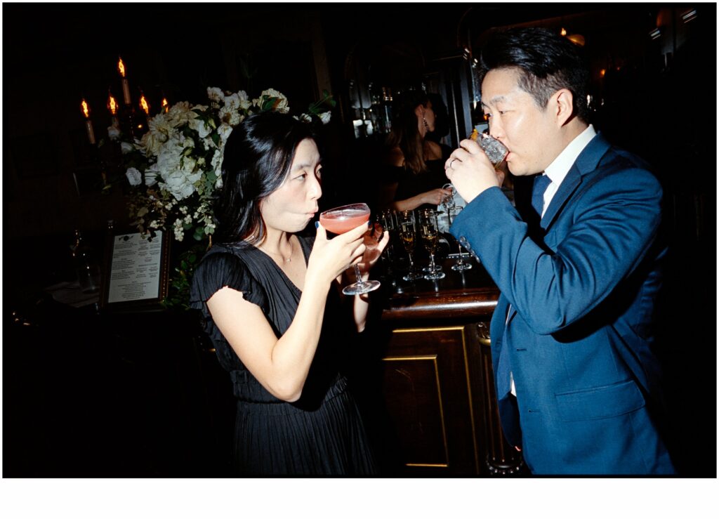Guests drink craft cocktails at a Philadelphia wedding reception.