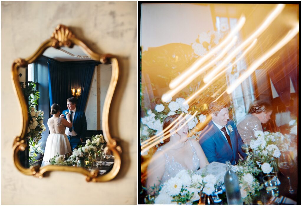 A gilded mirror reflects a bride straightening a groom's tie and talking about how to have a small wedding.