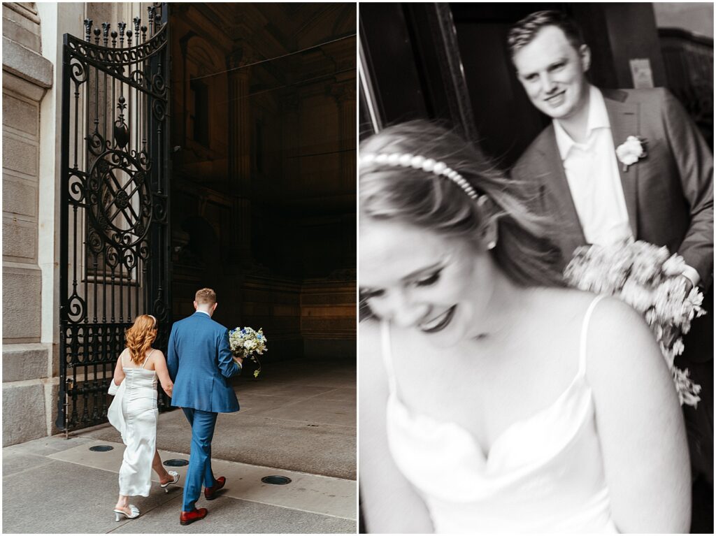 A bride and groom walk through an iron gate leading into Philadelphia City Hall.