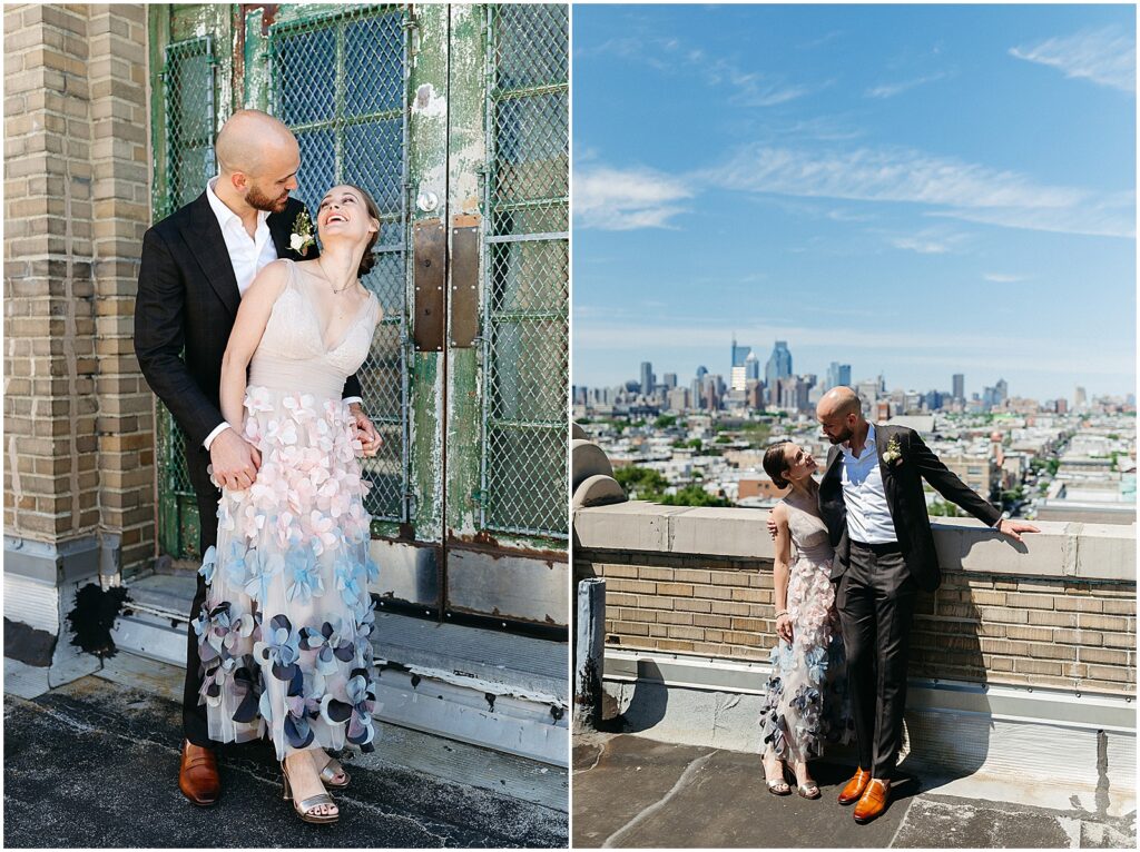 A bride and groom pose on the rooftop of the BOK Building with the Philadelphia skyline behind them.