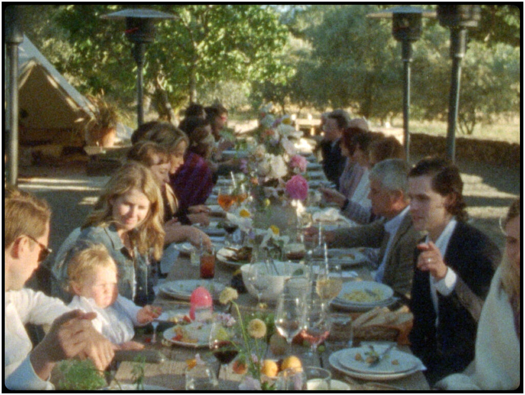 Guests eat dinner in Sonoma during a destination wedding